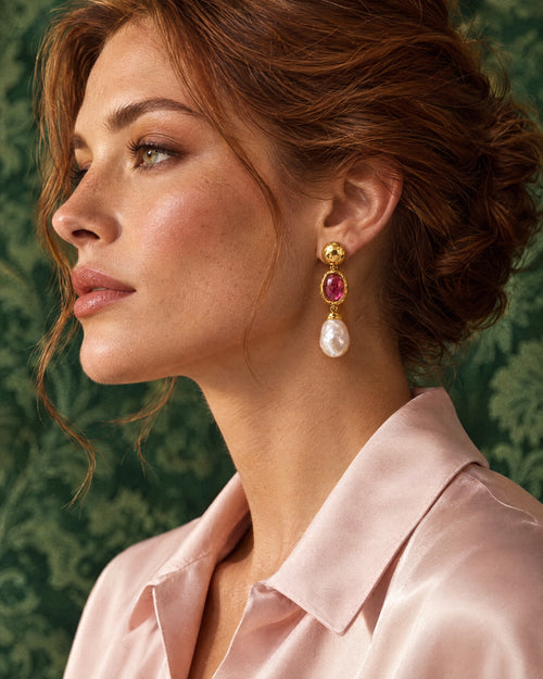 Boucles Pivoine worn with pinned-up auburn hair, in profile