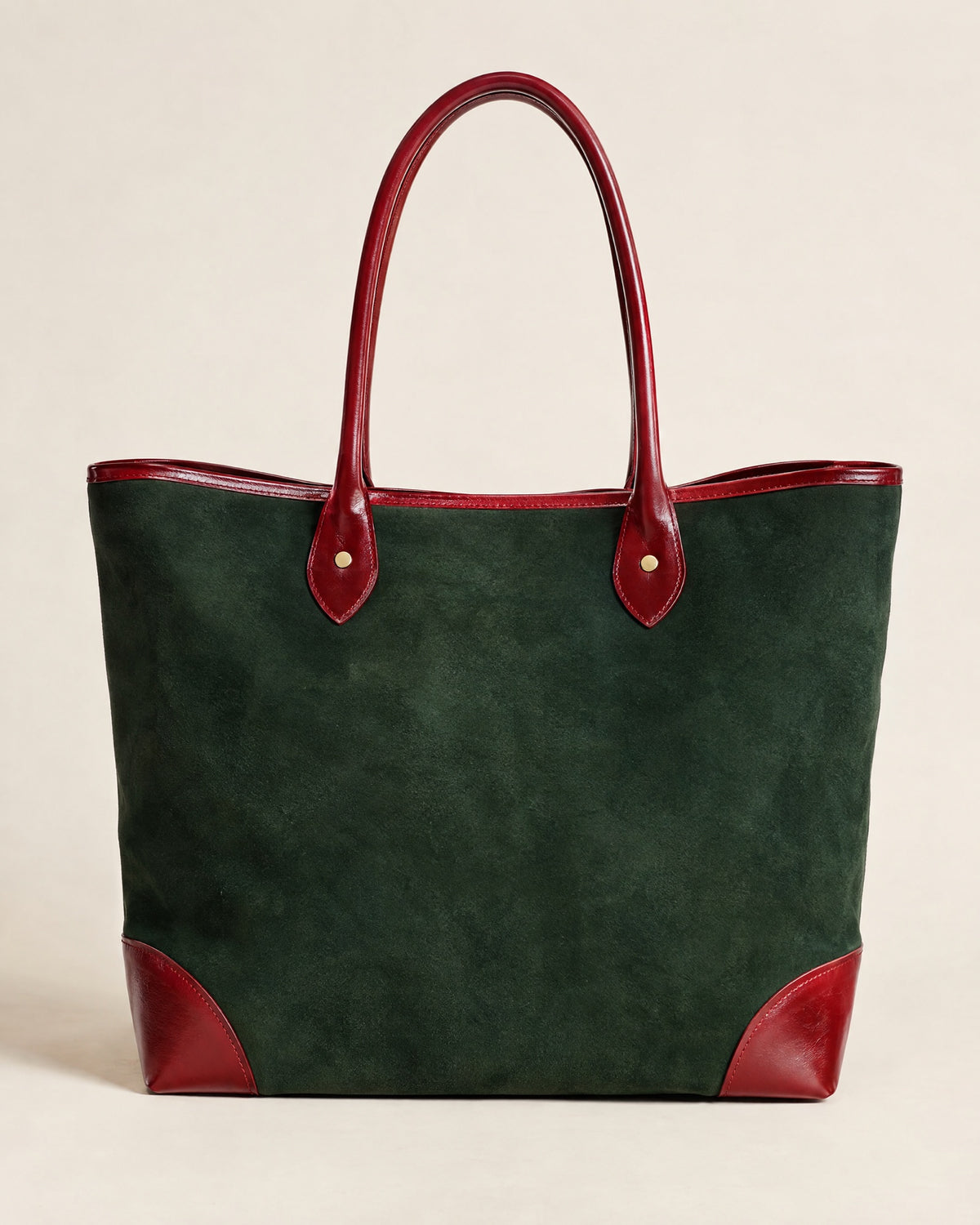 Le Cabas tote in bottle-green suede with lacquer-red calf handles